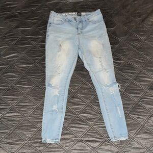 Sky Blue Ripped Skinny Jeans for Women